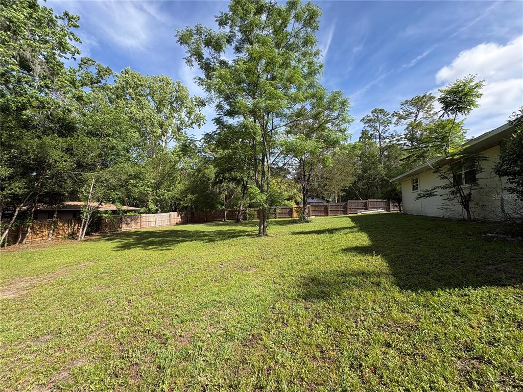 3922 South Apopka Avenue Inverness, FL 34452 - Photo 29 of 39 a view of a yard with a house
