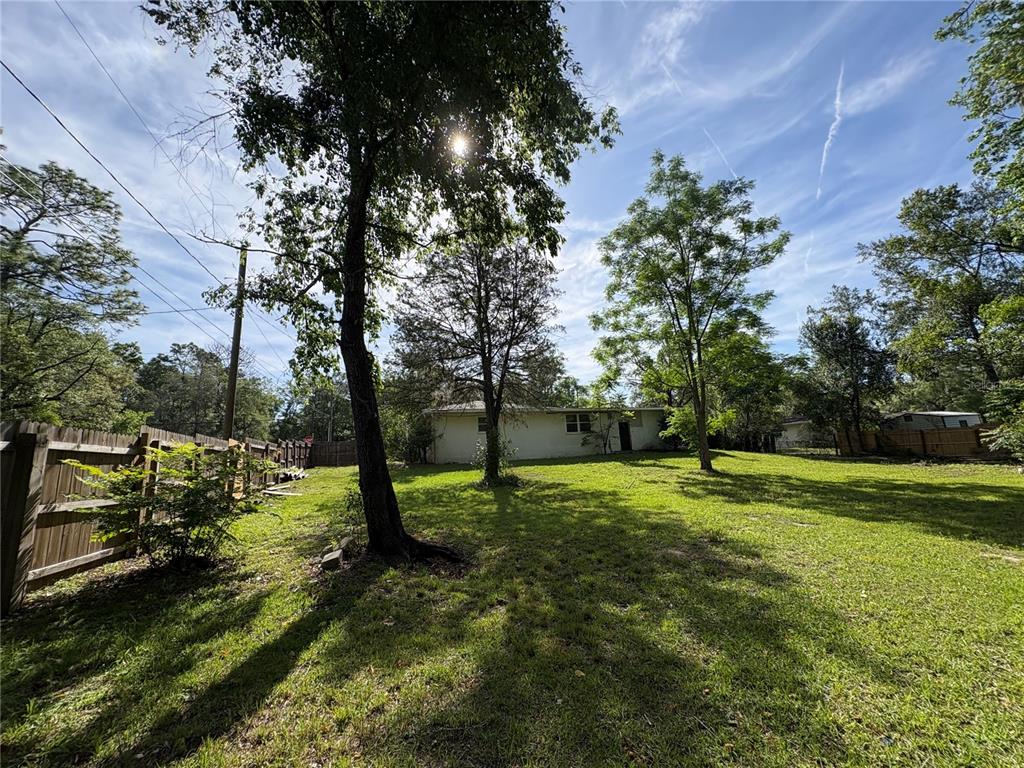 3922 South Apopka Avenue Inverness, FL 34452 - Photo 3 of 39 a view of a park with large trees