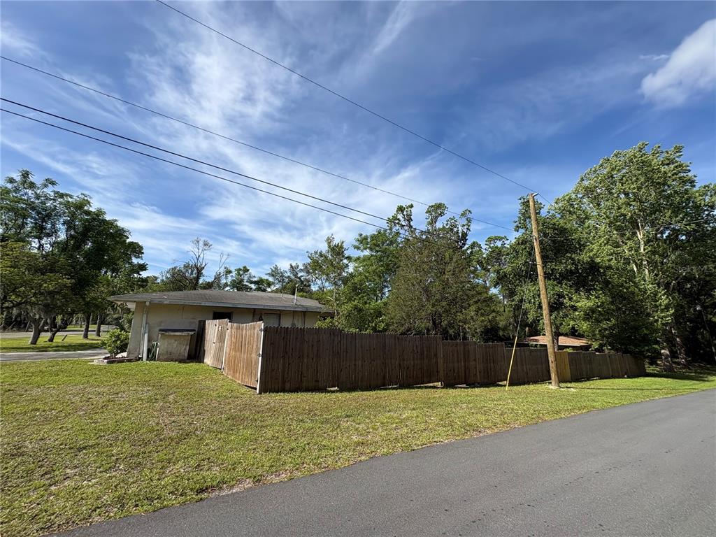 3922 South Apopka Avenue Inverness, FL 34452 - Photo 31 of 39 a view of a house with a yard