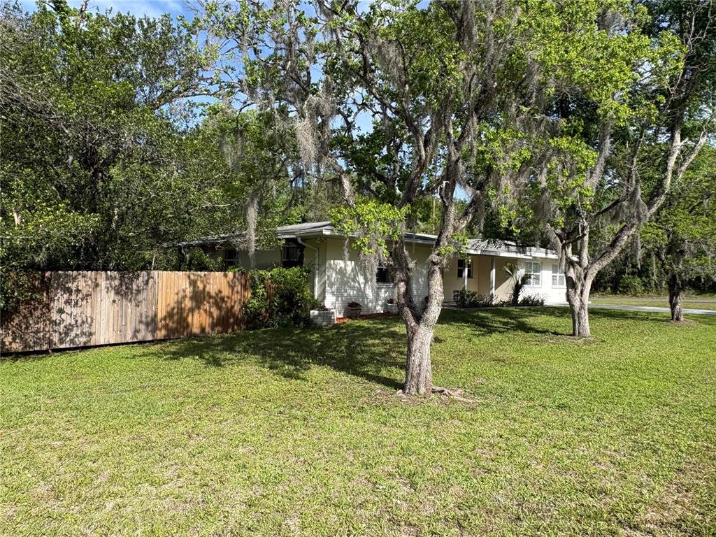 3922 South Apopka Avenue Inverness, FL 34452 - Photo 37 of 39 a view of a house with backyard