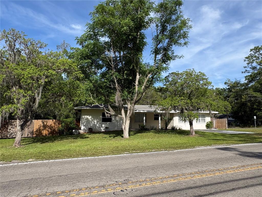 3922 South Apopka Avenue Inverness, FL 34452 - Photo 39 of 39 a view of a house with a big yard