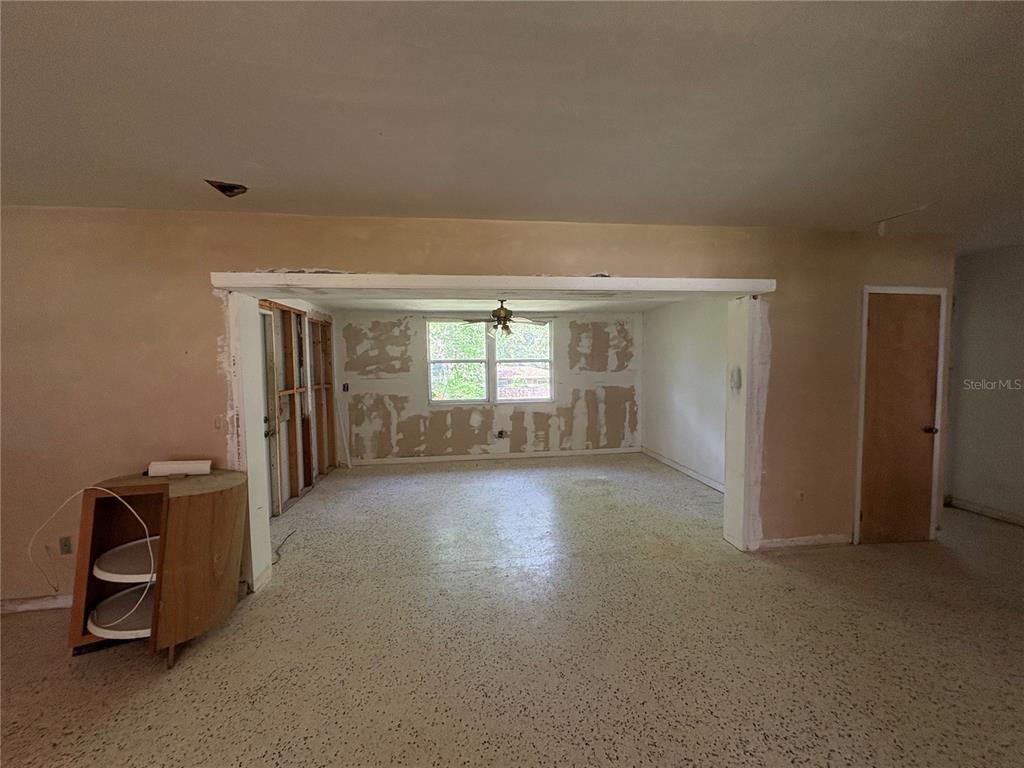 3922 South Apopka Avenue Inverness, FL 34452 - Photo 7 of 39 a view of a livingroom with a staircase