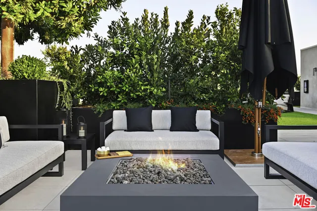 a view of backyard with furniture