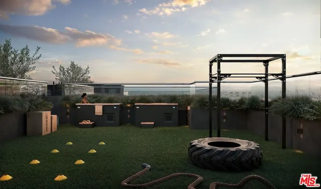 a view of a terrace with outdoor seating and city view