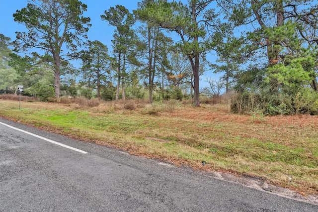 a fire hydrant in the middle of a field