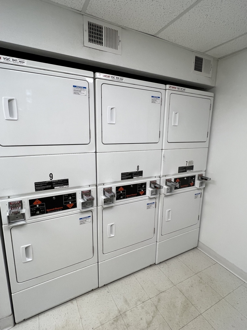 1024 West Byron Street, Unit 3W Chicago, IL 60613 - Photo 27 of 27 a view white cabinets and washer dryer