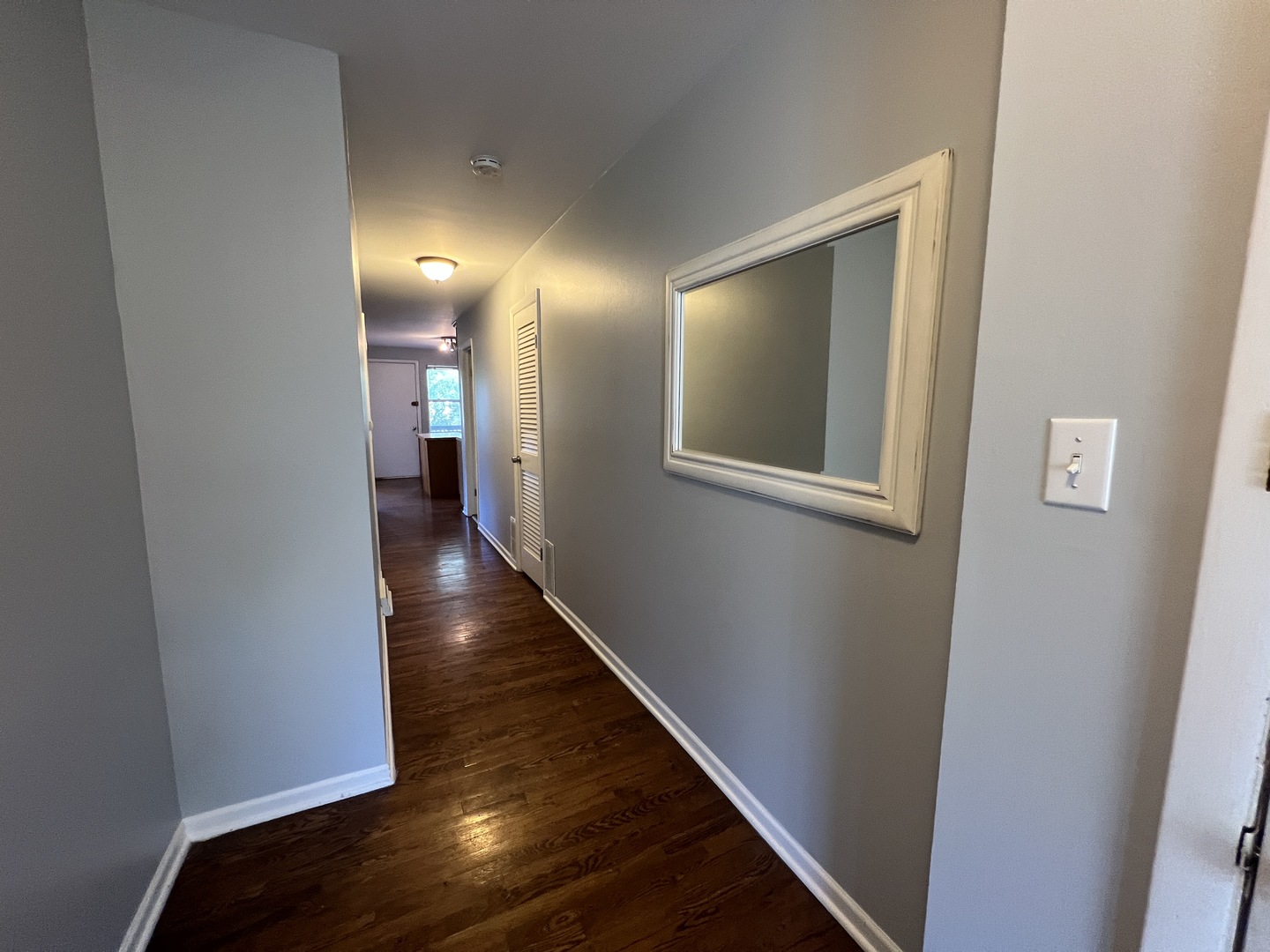 1024 West Byron Street, Unit 3W Chicago, IL 60613 - Photo 9 of 27 a view of a hallway with wooden floor