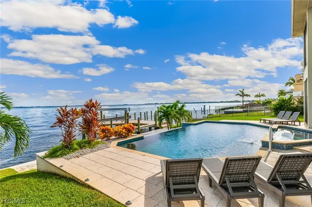 an aerial view of a house with outdoor space