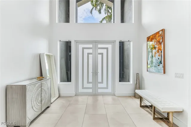 a view of a hallway with windows