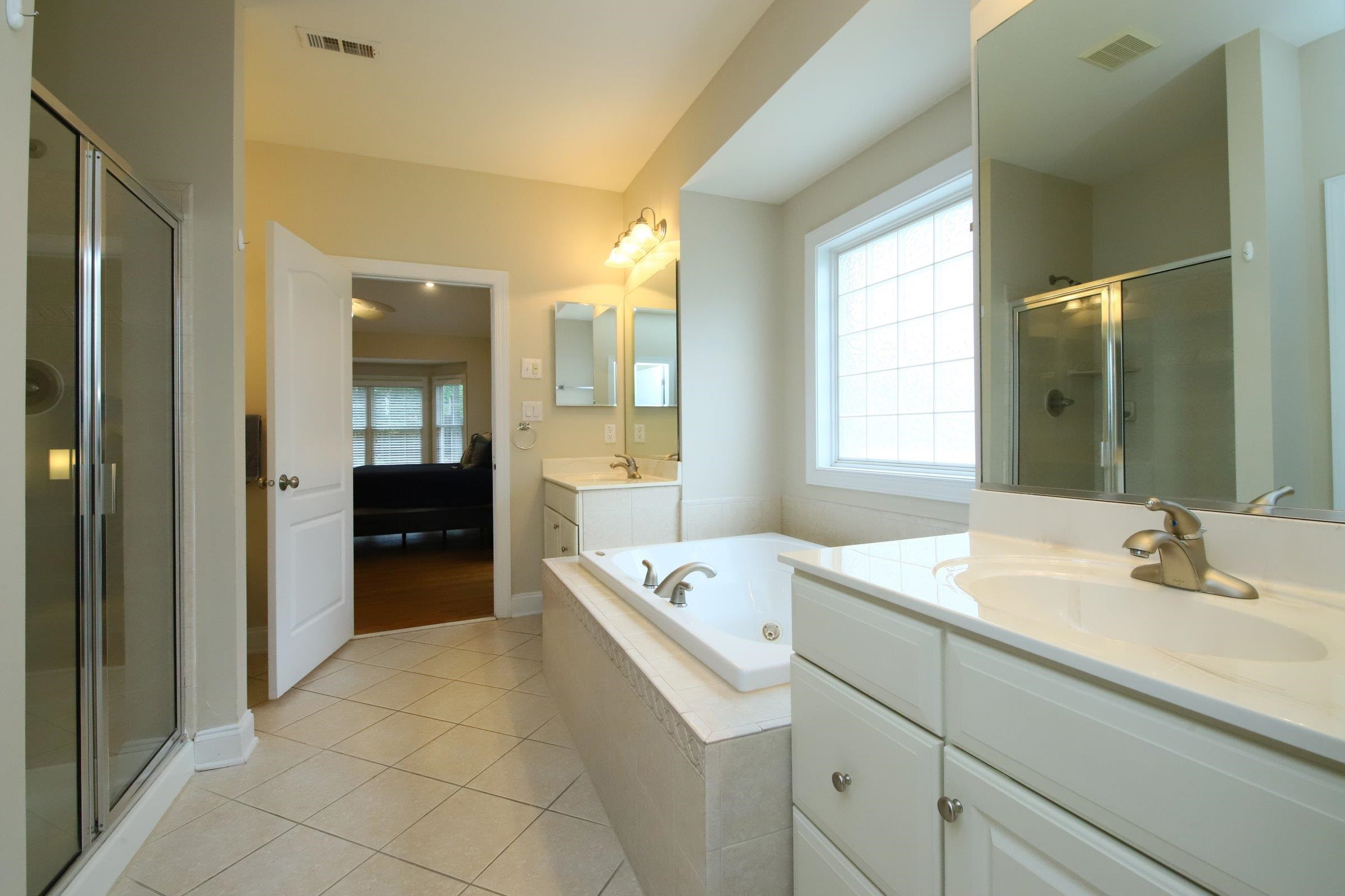 9312 Naples Court Raleigh, NC 27617 - Photo 16 of 30 Owner's Bath
