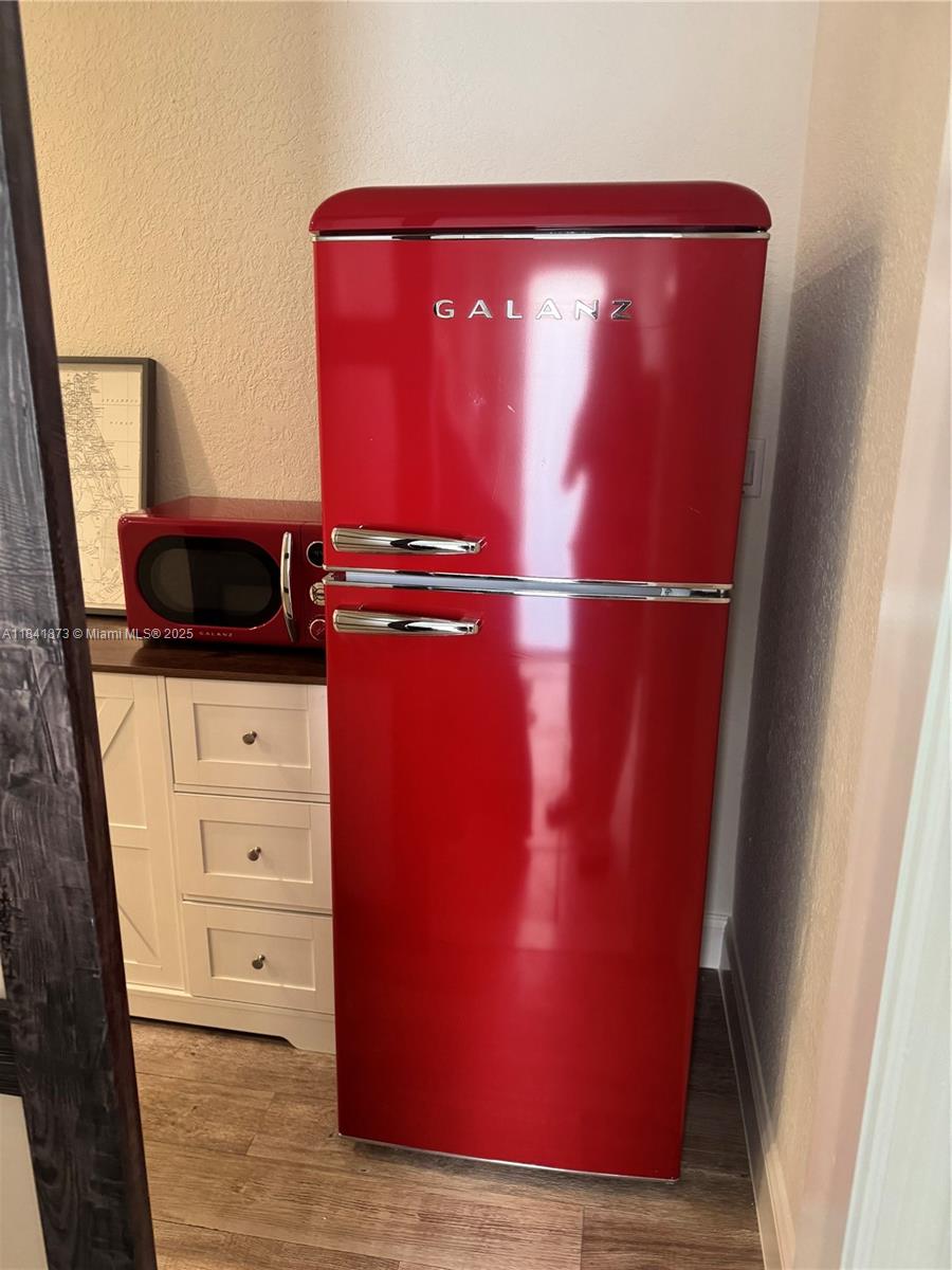 15603 Southwest 178th Street Miami, FL 33187 - Photo 4 of 11 a view of walk in closet