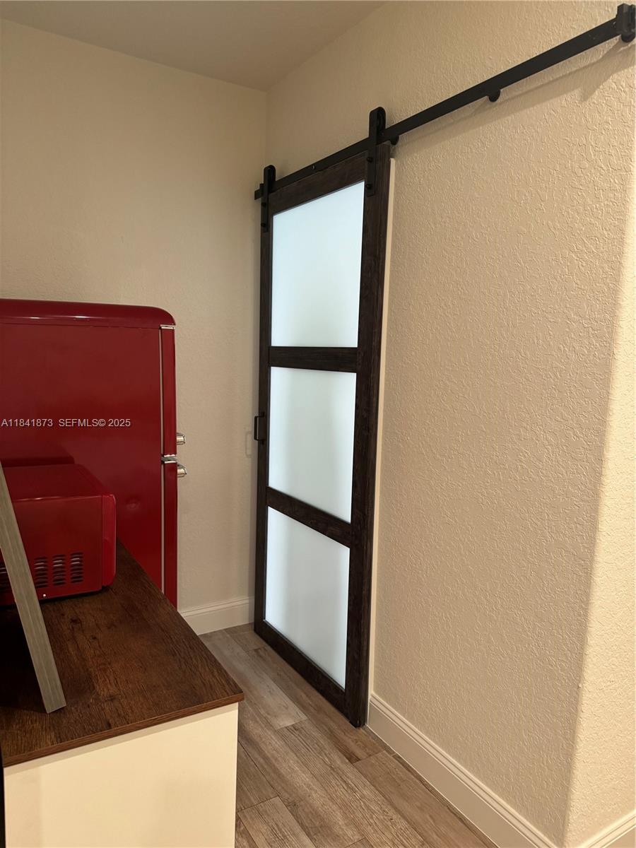 15603 Southwest 178th Street Miami, FL 33187 - Photo 5 of 11 a view of an empty room