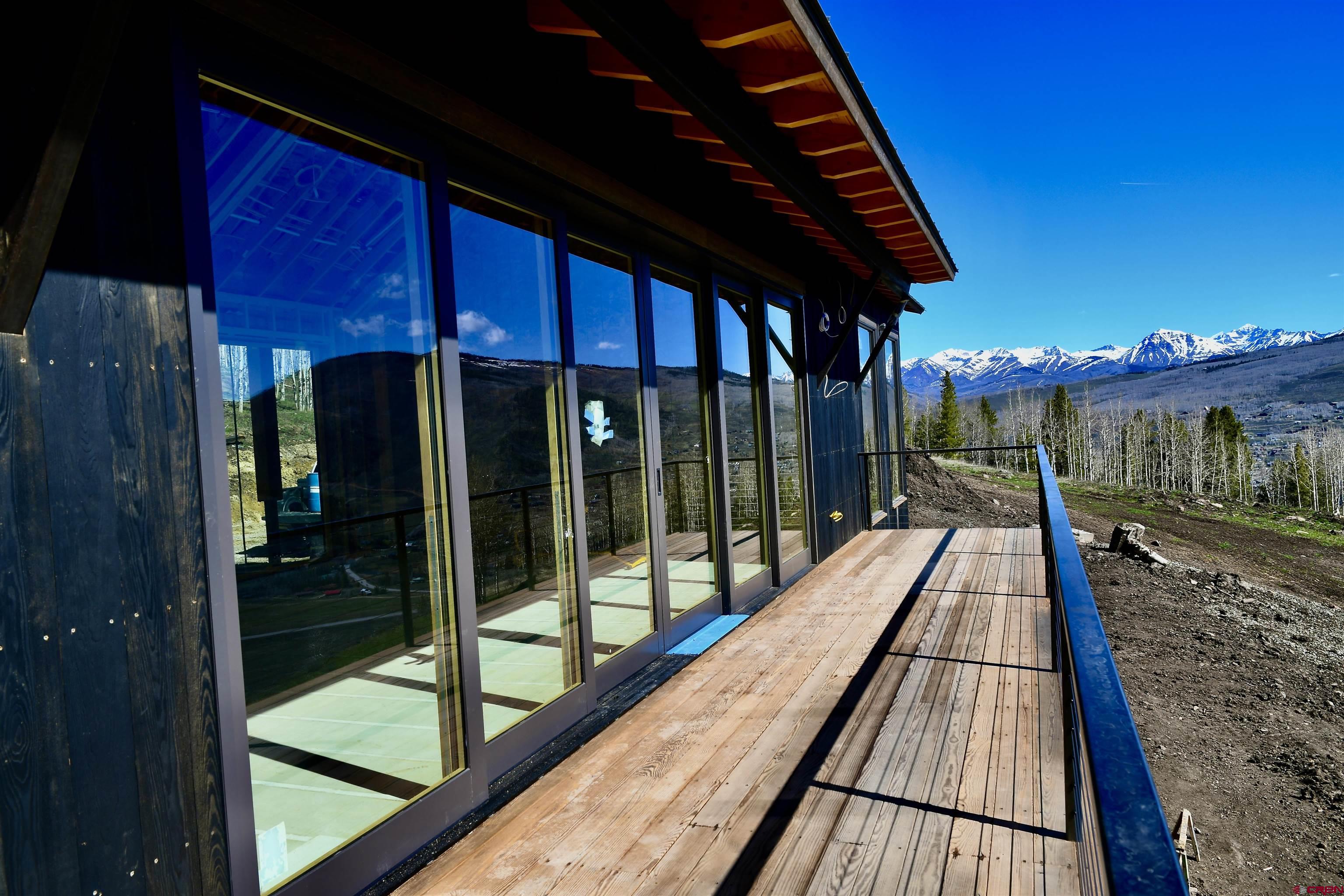 1620 Red Mountain Ranch Road Crested Butte, CO 81224 - Photo 19 of 45 a view of balcony with couch