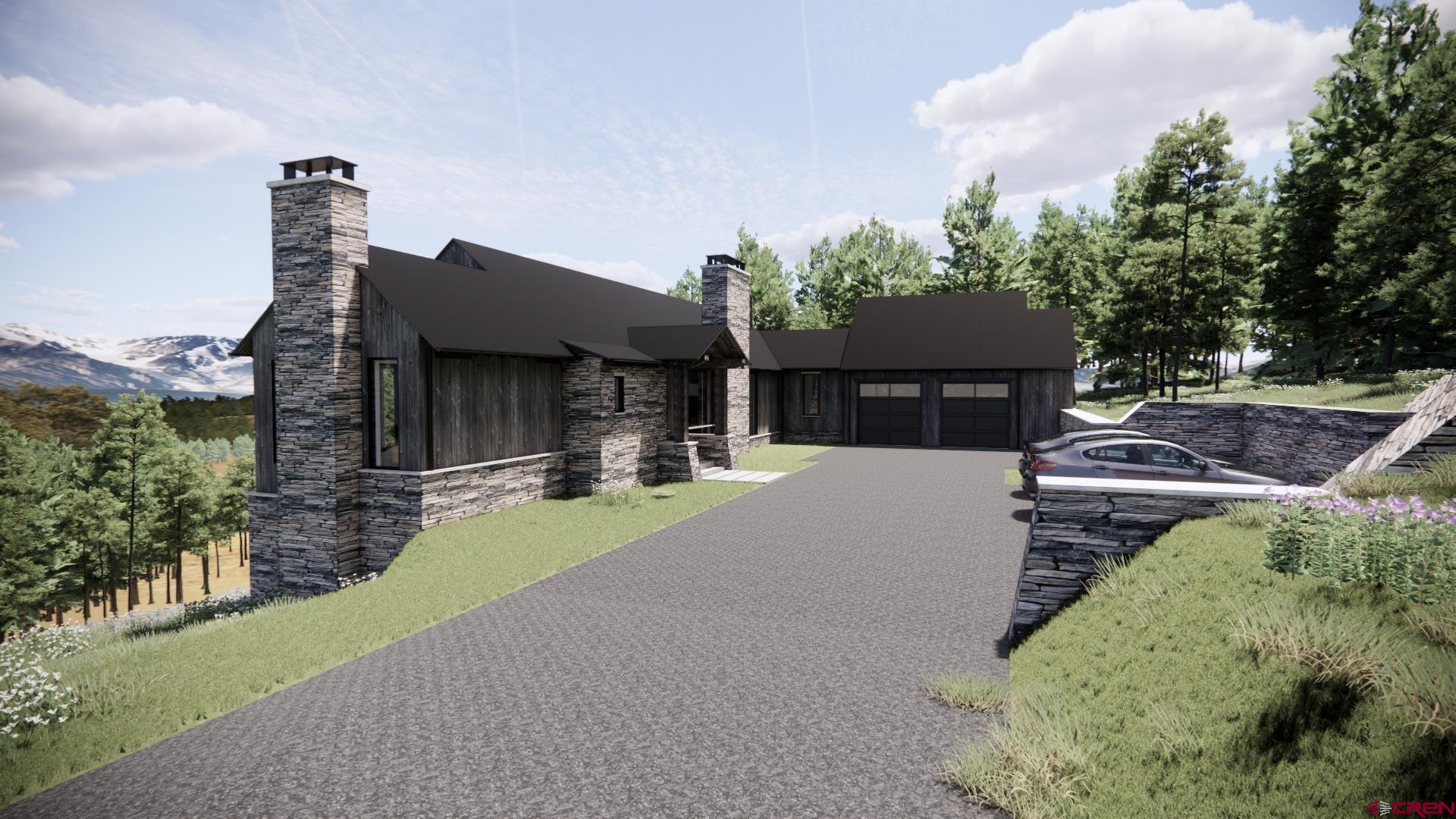 1620 Red Mountain Ranch Road Crested Butte, CO 81224 - Photo 21 of 45 a front view of a house with a yard and garage