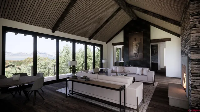 a living room with fireplace furniture and a large window