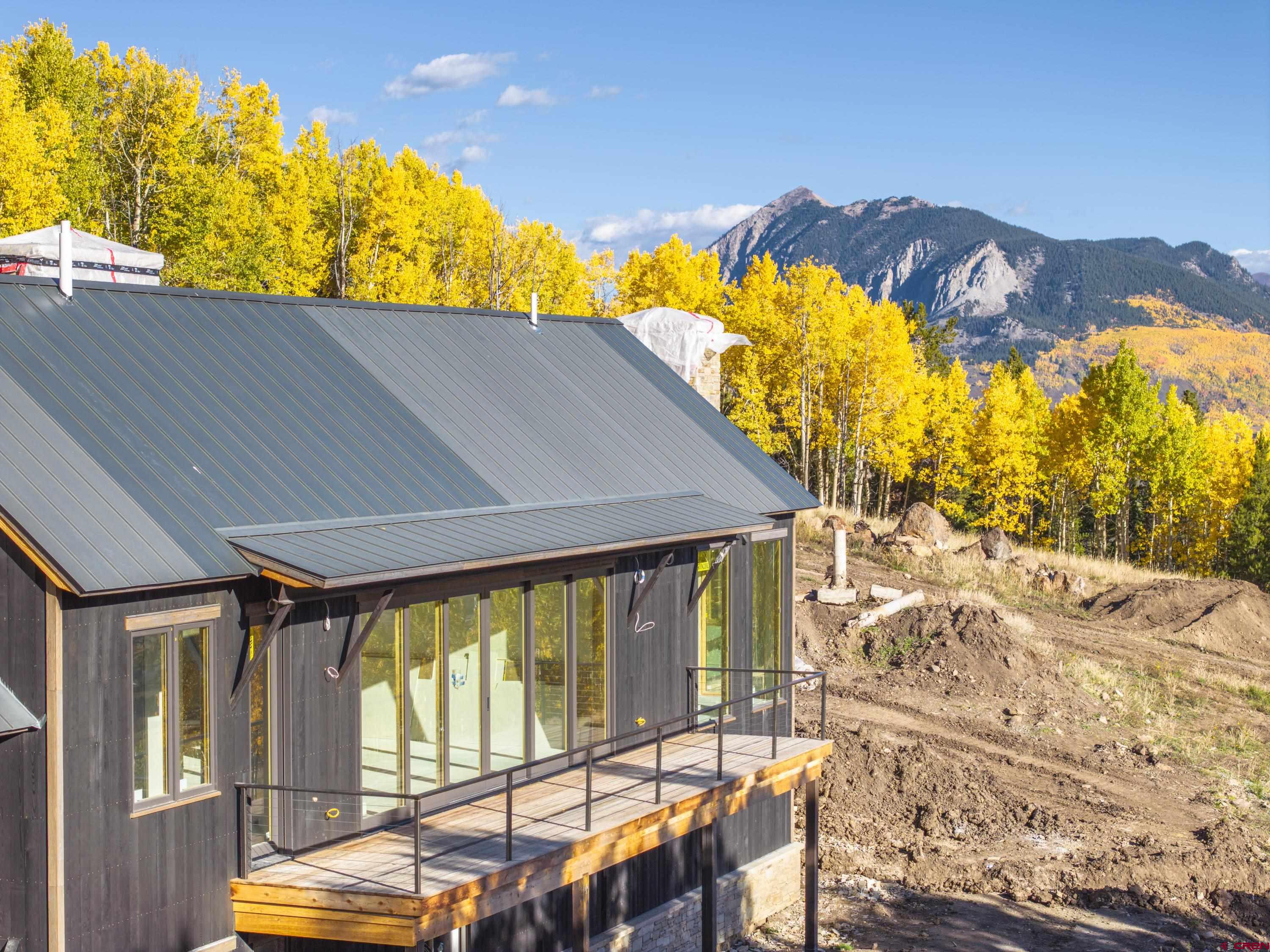 1620 Red Mountain Ranch Road Crested Butte, CO 81224 - Photo 4 of 45 a view of a balcony with furniture