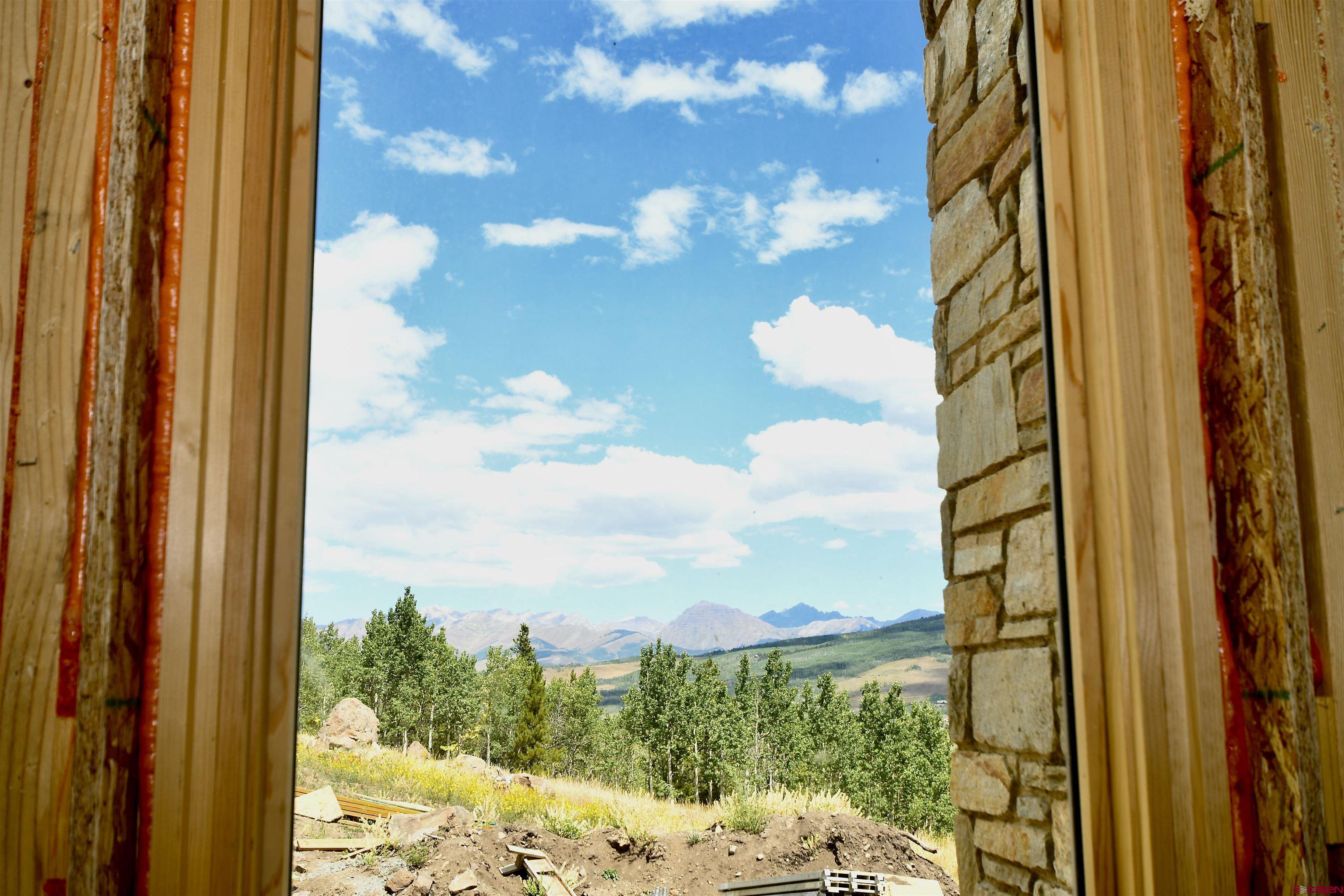 1620 Red Mountain Ranch Road Crested Butte, CO 81224 - Photo 41 of 45 a view of a yard from a window
