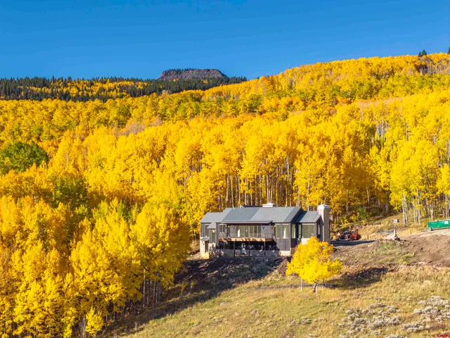 a view of a swimming pool with an outdoor space and seating area