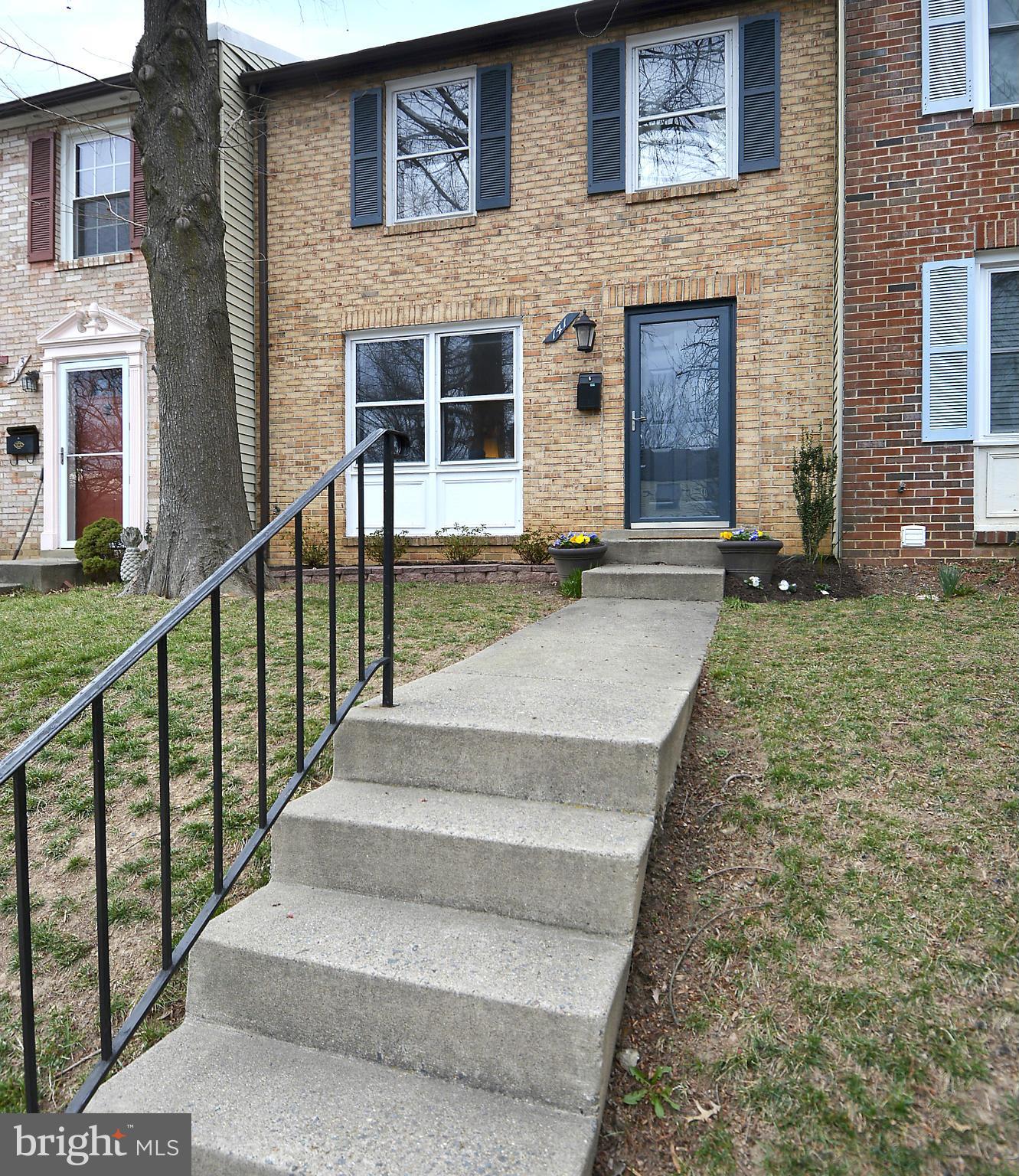 141 Annandale Road Falls Church, VA 22046 - Photo 1 of 30 a front view of a house with stairs