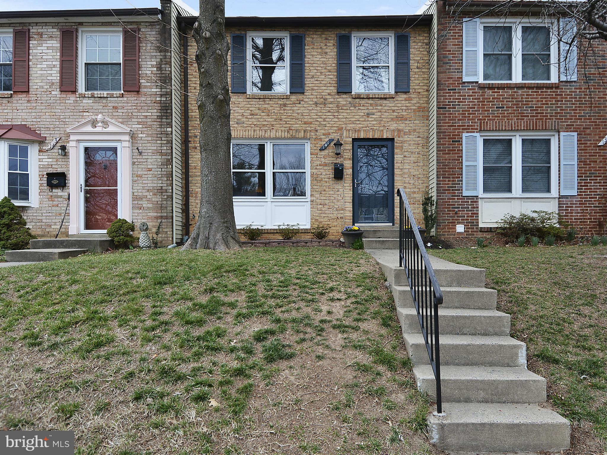 141 Annandale Road Falls Church, VA 22046 - Photo 2 of 30 a front view of a house with a yard