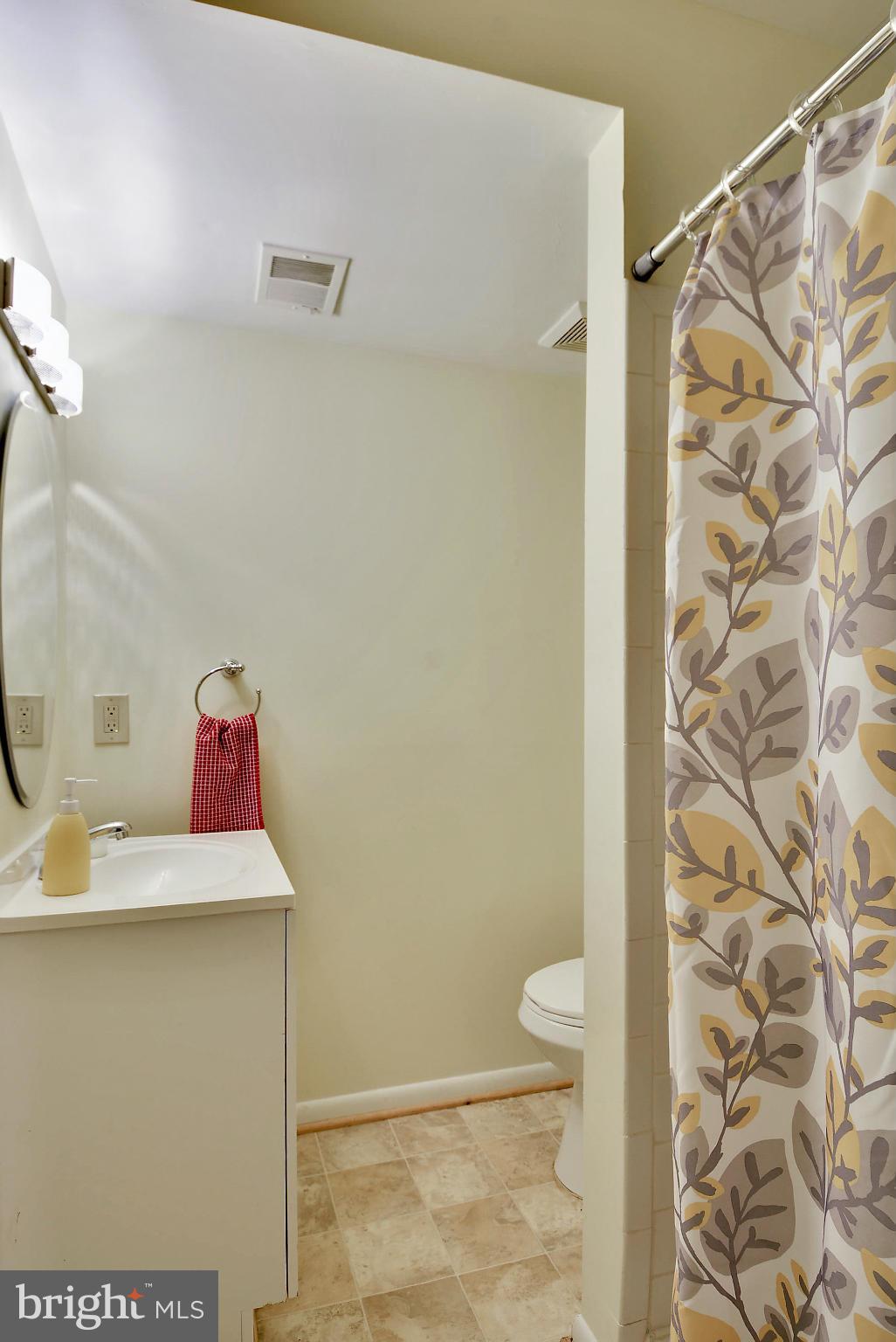 141 Annandale Road Falls Church, VA 22046 - Photo 12 of 30 a bathroom with a sink and a toilet