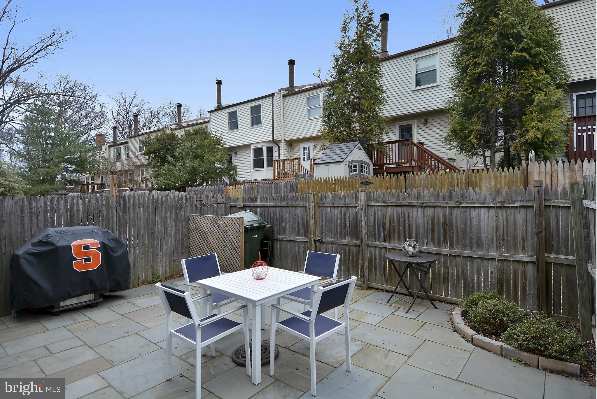 141 Annandale Road Falls Church, VA 22046 - Photo 18 of 30 a backyard of a house with table and chairs