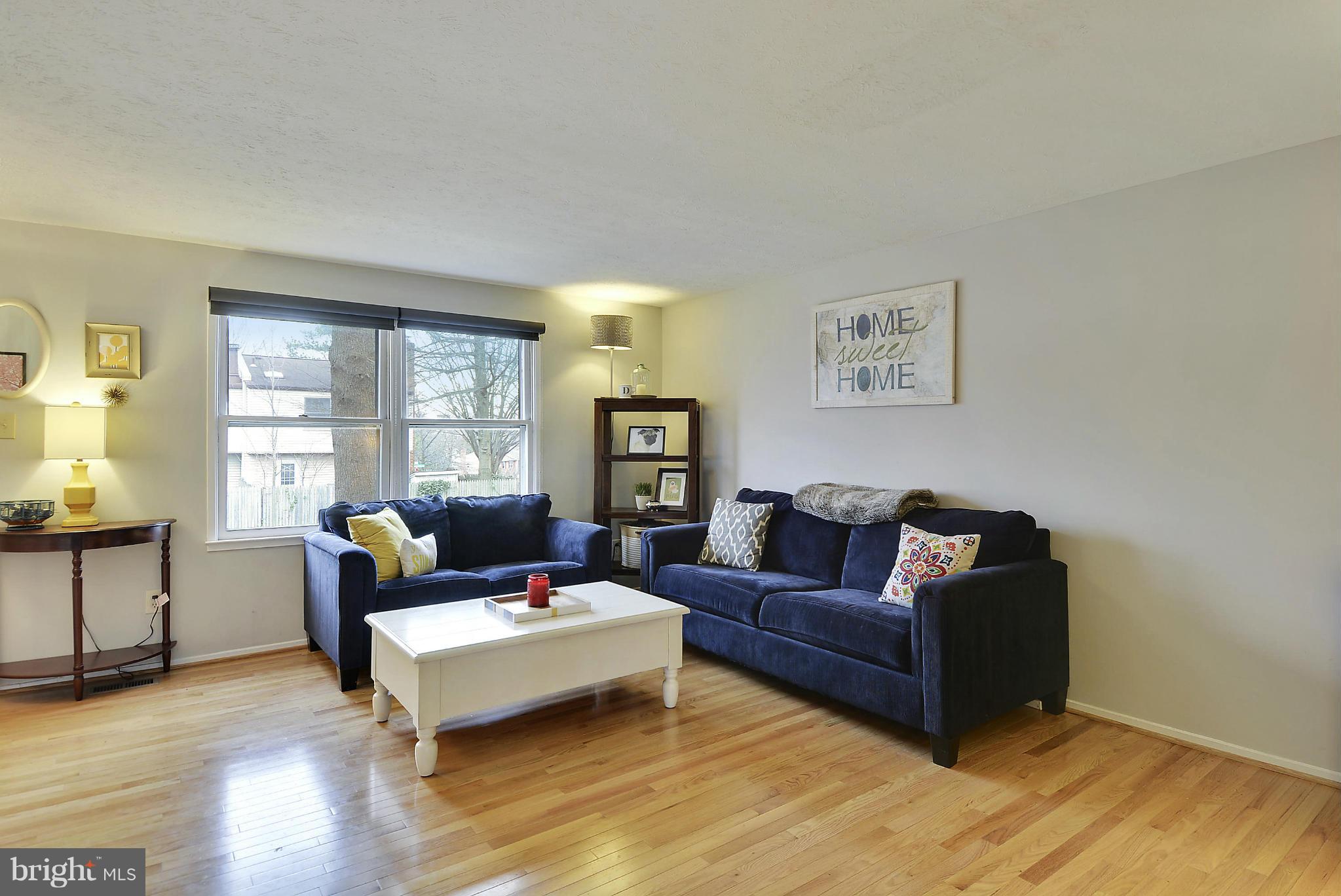 141 Annandale Road Falls Church, VA 22046 - Photo 3 of 30 a living room with furniture and a window