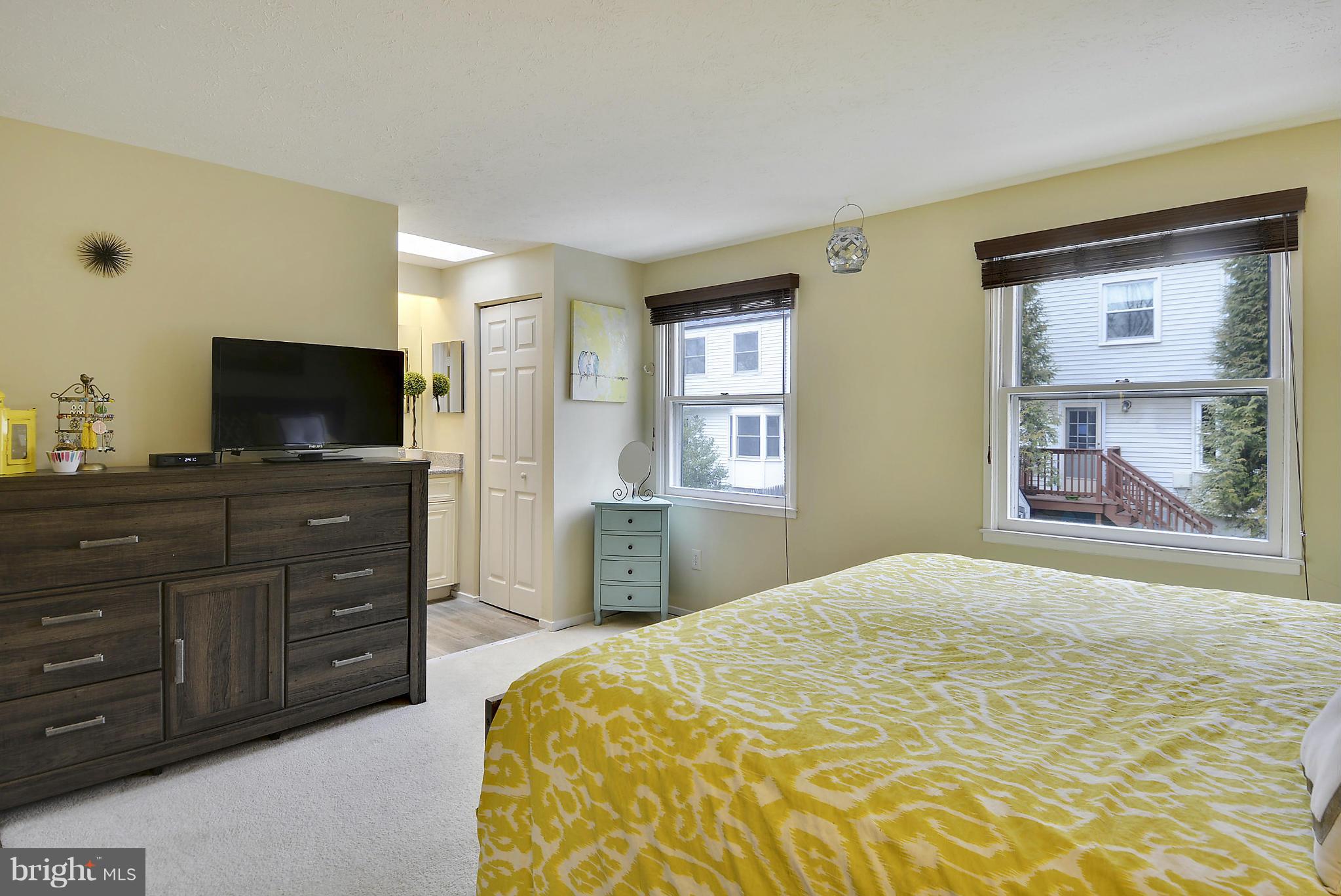 141 Annandale Road Falls Church, VA 22046 - Photo 9 of 30 a bedroom with a bed and a flat screen tv