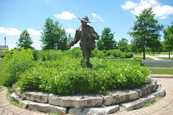 a view of a garden with a fountain