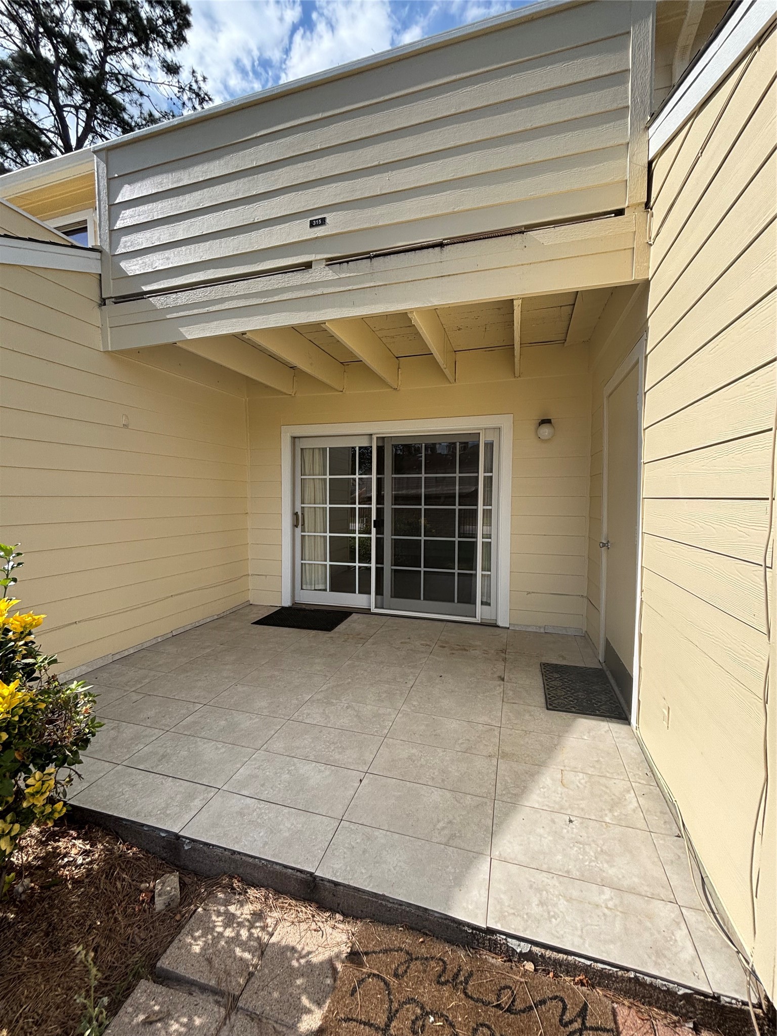 14515 Wunderlich Drive, Unit 315 Houston, TX 77069 - Photo 32 of 37 French Doors lead to Private Patio with Storage Closet