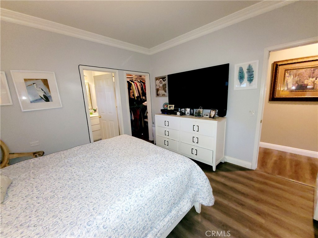 14119 Ashton Lane Riverside, CA 92508 - Photo 18 of 47 a bedroom with a bed and a flat screen tv
