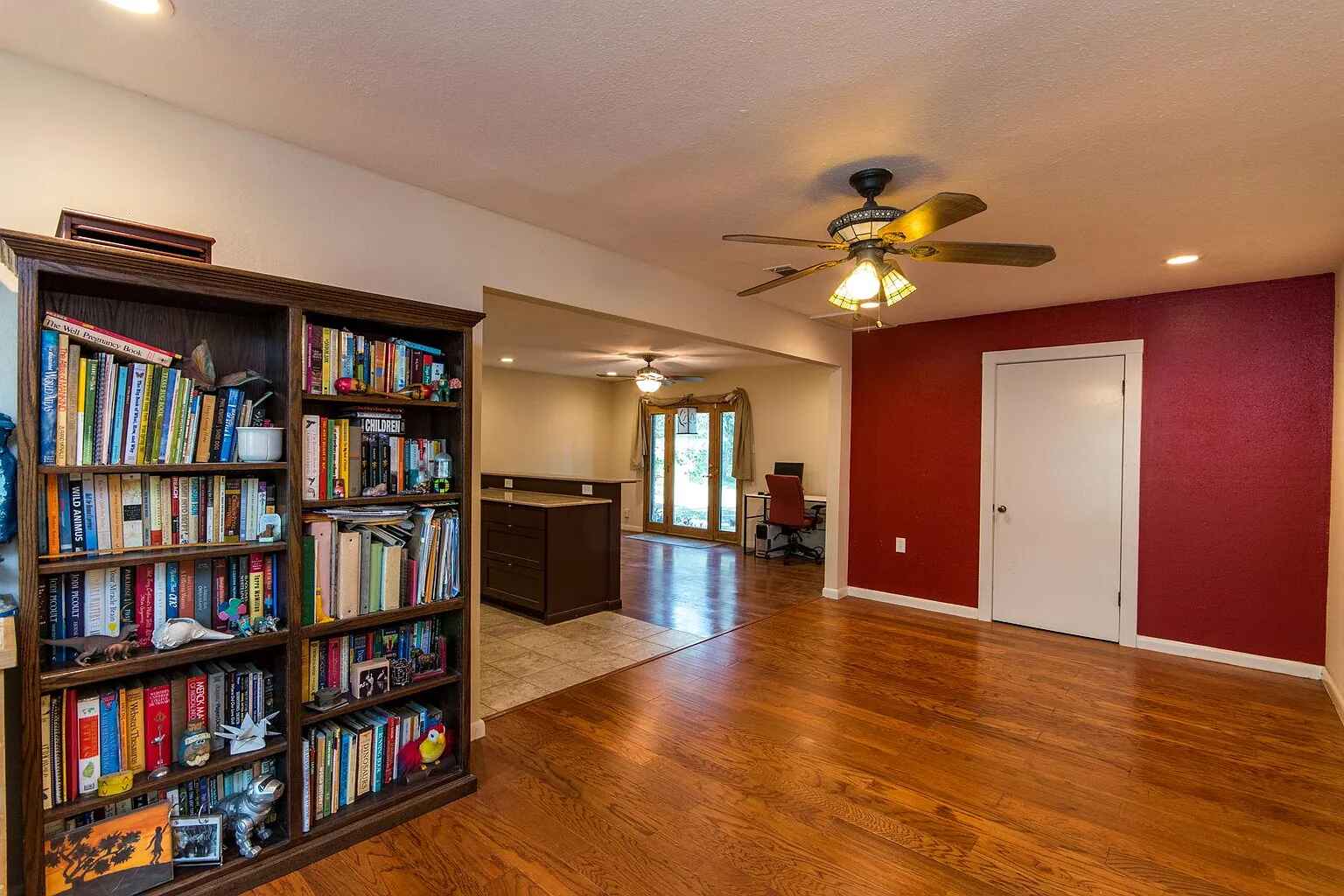 1207 Fieldcrest Drive Austin, TX 78704 - Photo 5 of 13 a view of a livingroom with furniture and book shelf