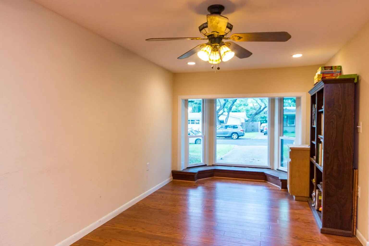 1207 Fieldcrest Drive Austin, TX 78704 - Photo 6 of 13 wooden floor in an empty room with a window