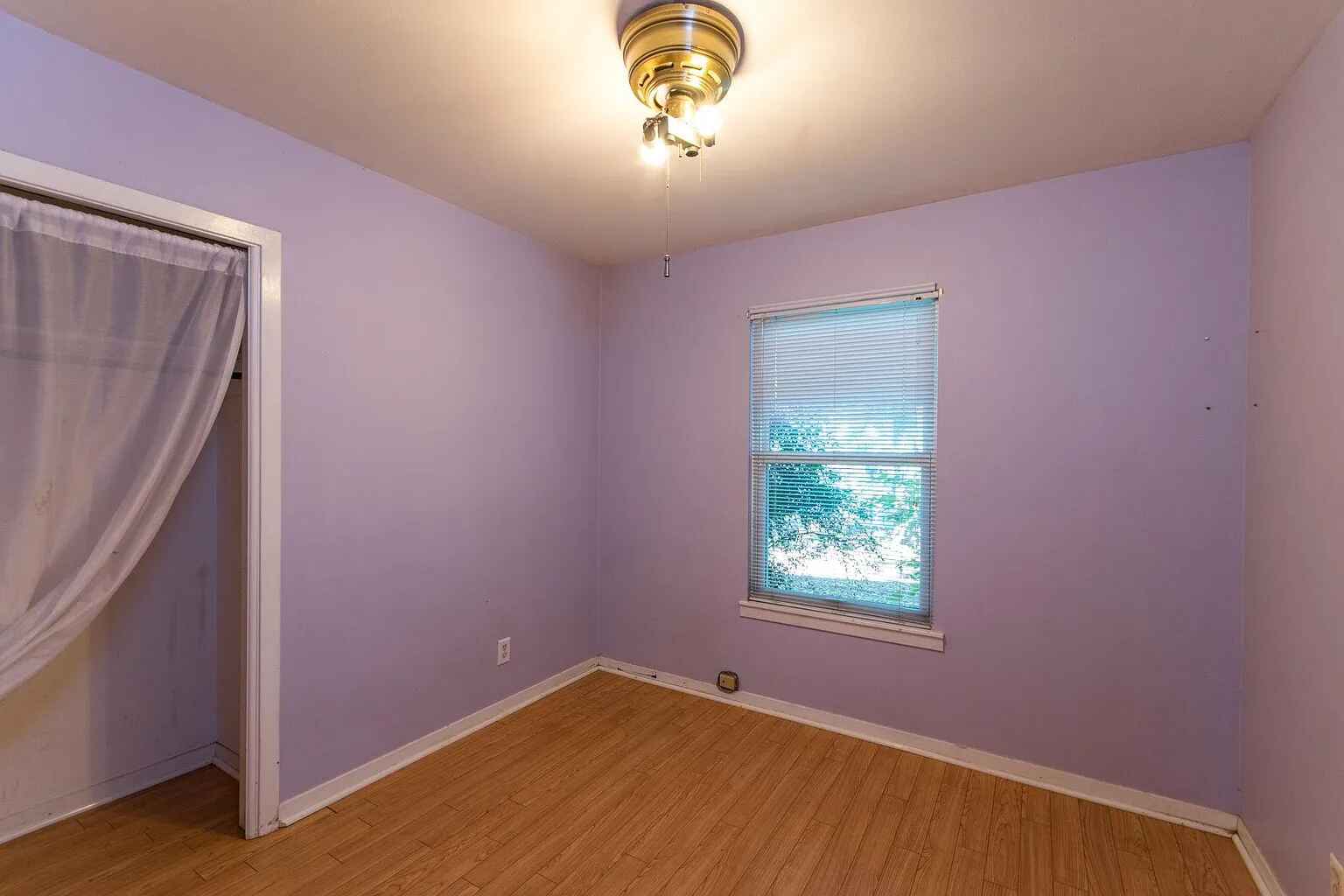 1207 Fieldcrest Drive Austin, TX 78704 - Photo 10 of 13 a view of an empty room with a window