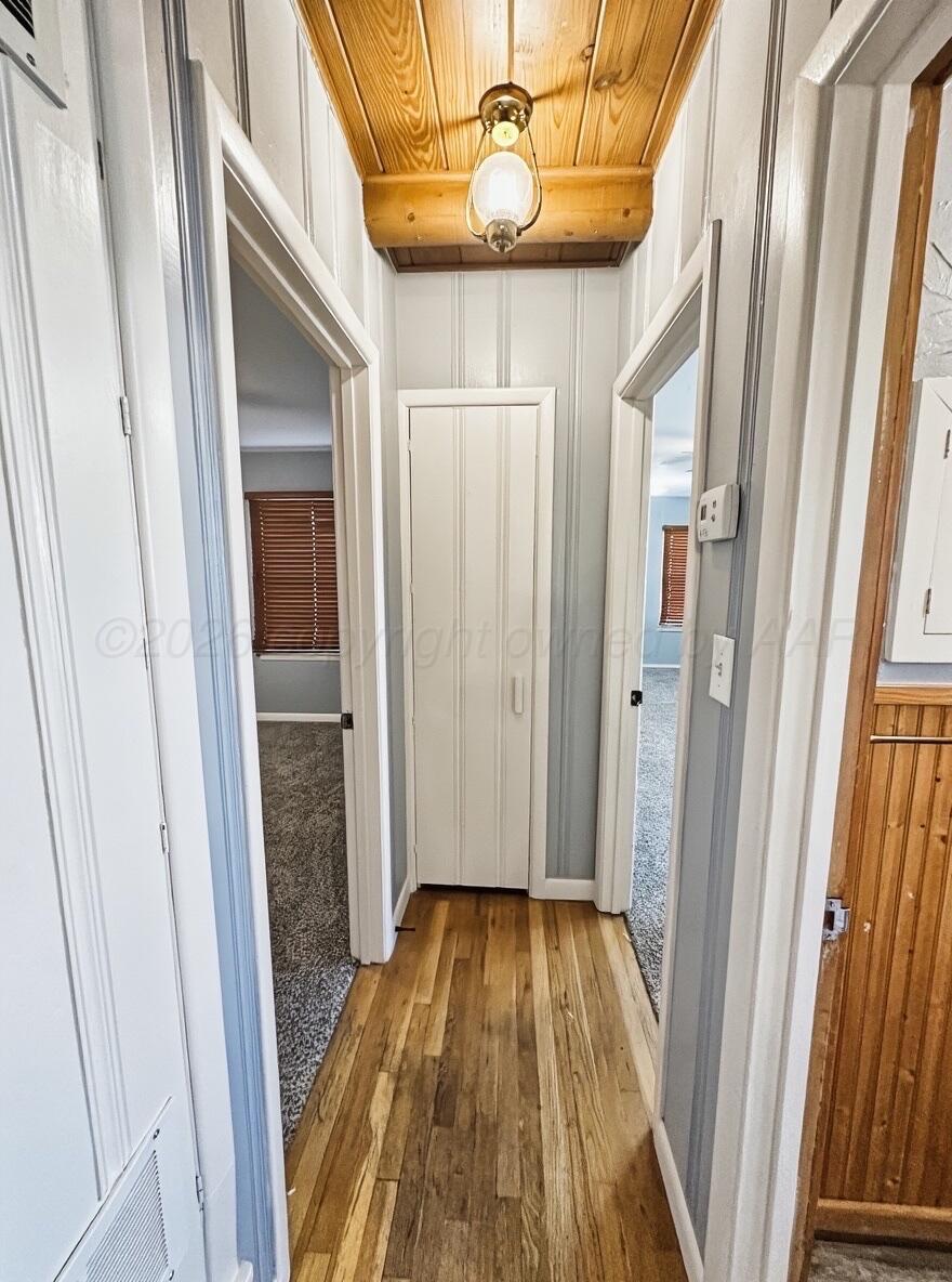 506 Northwest 4th Street Tulia, TX 79088 - Photo 20 of 30 a view of entryway with wooden floor