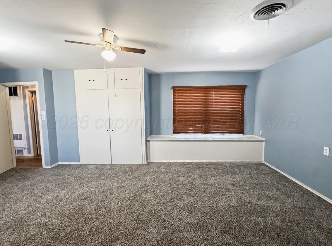 506 Northwest 4th Street Tulia, TX 79088 - Photo 23 of 30 a view of an empty room with a window