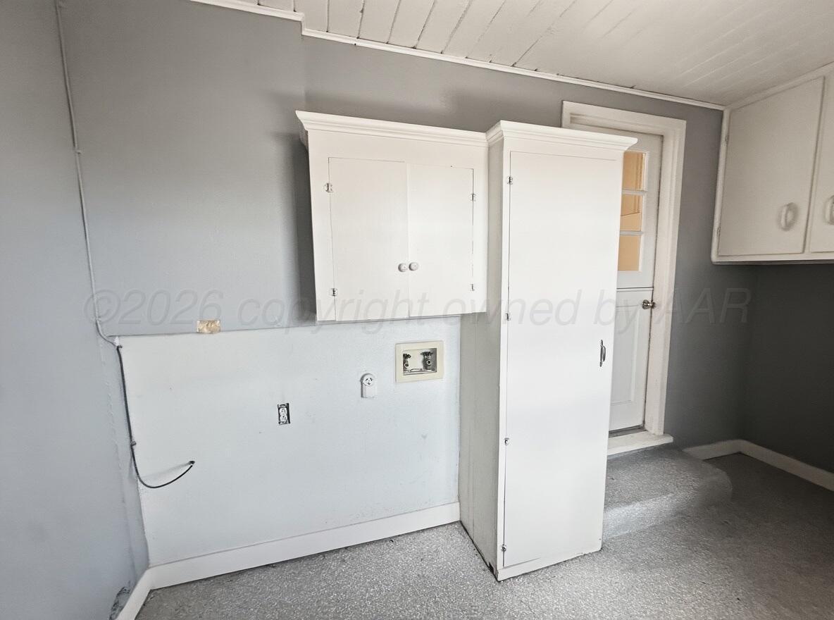 506 Northwest 4th Street Tulia, TX 79088 - Photo 28 of 30 a view of cabinets