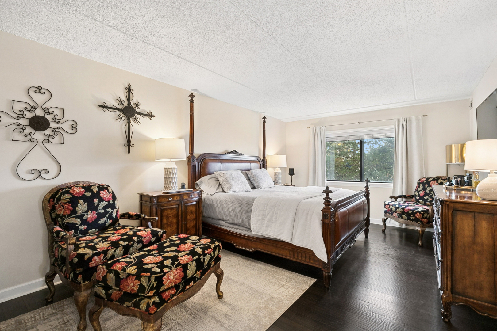 920 Vose Drive, Unit 202 Gurnee, IL 60031 - Photo 13 of 21 a bedroom with bed and glass door