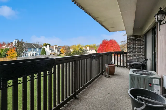 a view of balcony with furniture