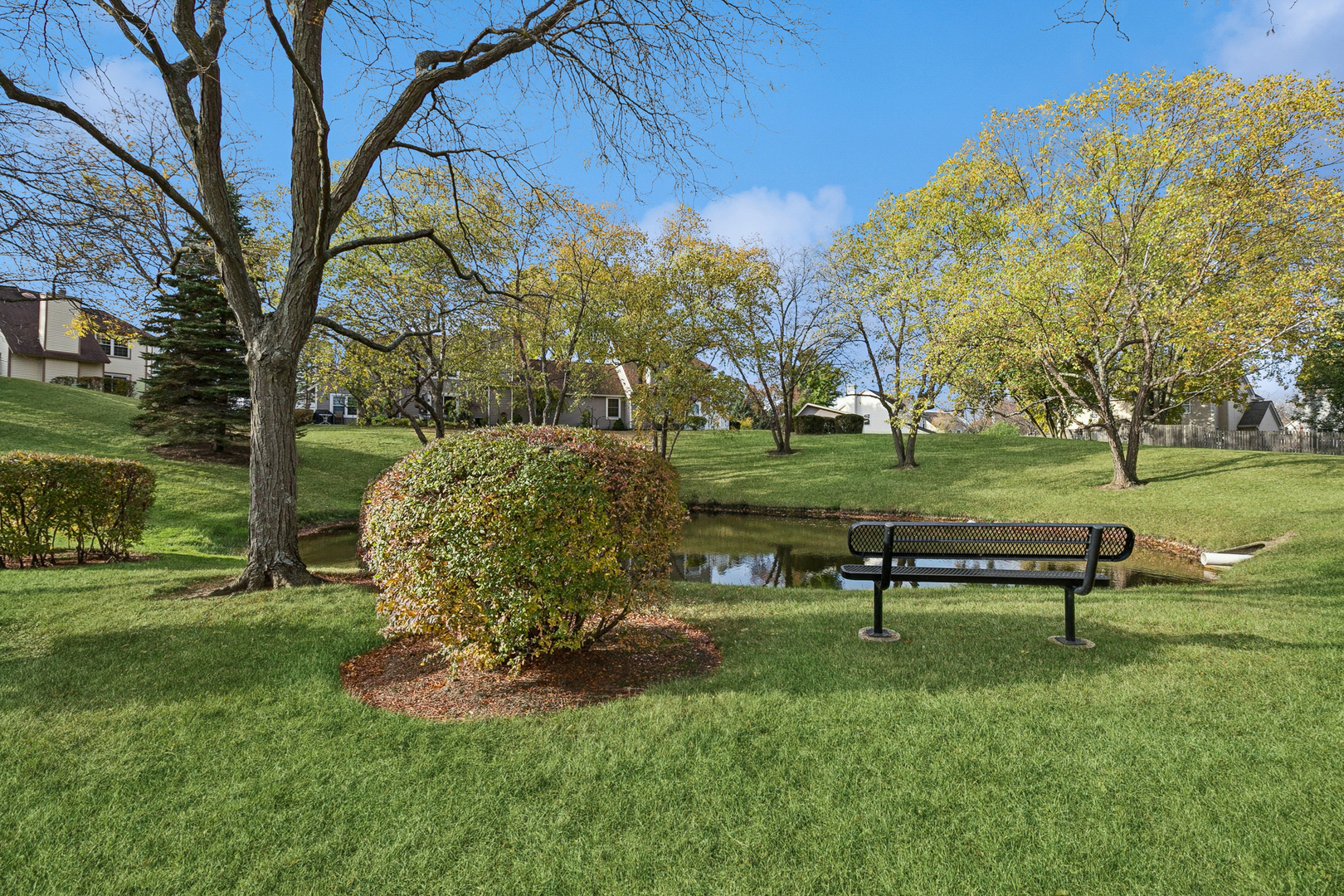 920 Vose Drive, Unit 202 Gurnee, IL 60031 - Photo 20 of 21 a view of a park with large trees