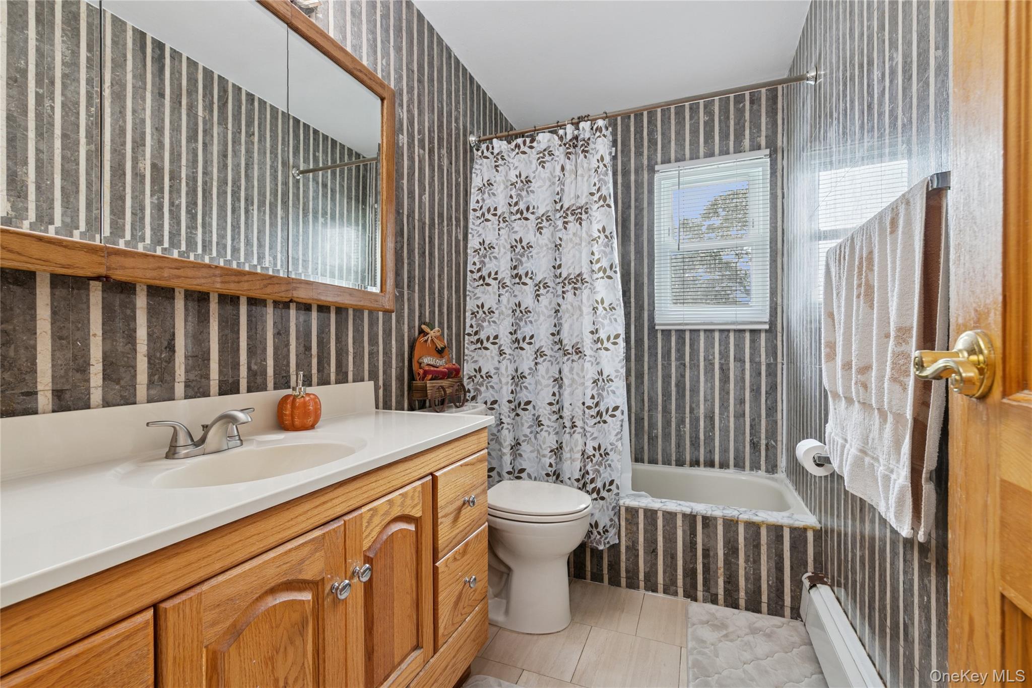 308 Browns Road Nesconset, NY 11767 - Photo 18 of 34 a bathroom with a sink toilet and shower