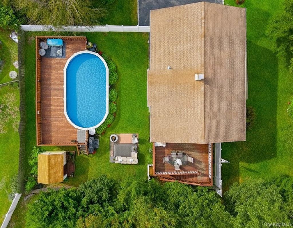 308 Browns Road Nesconset, NY 11767 - Photo 2 of 34 an aerial view of a house with swimming pool outdoor seating and yard