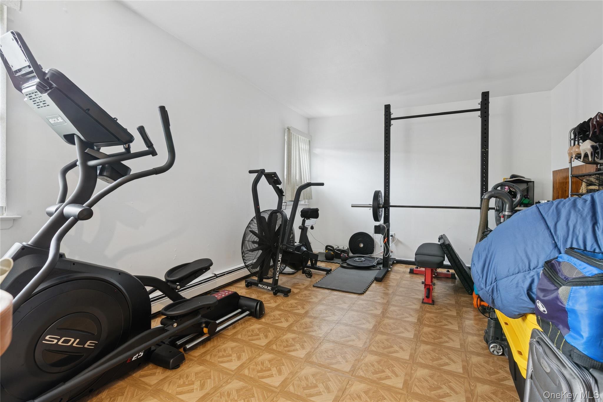 308 Browns Road Nesconset, NY 11767 - Photo 24 of 34 a room with gym equipment