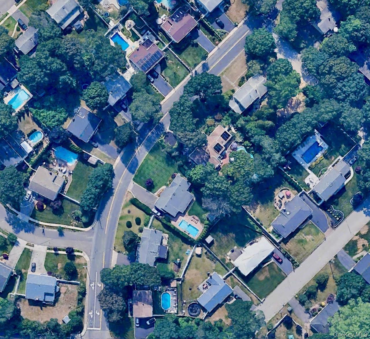 308 Browns Road Nesconset, NY 11767 - Photo 29 of 34 an aerial view of residential houses with outdoor space
