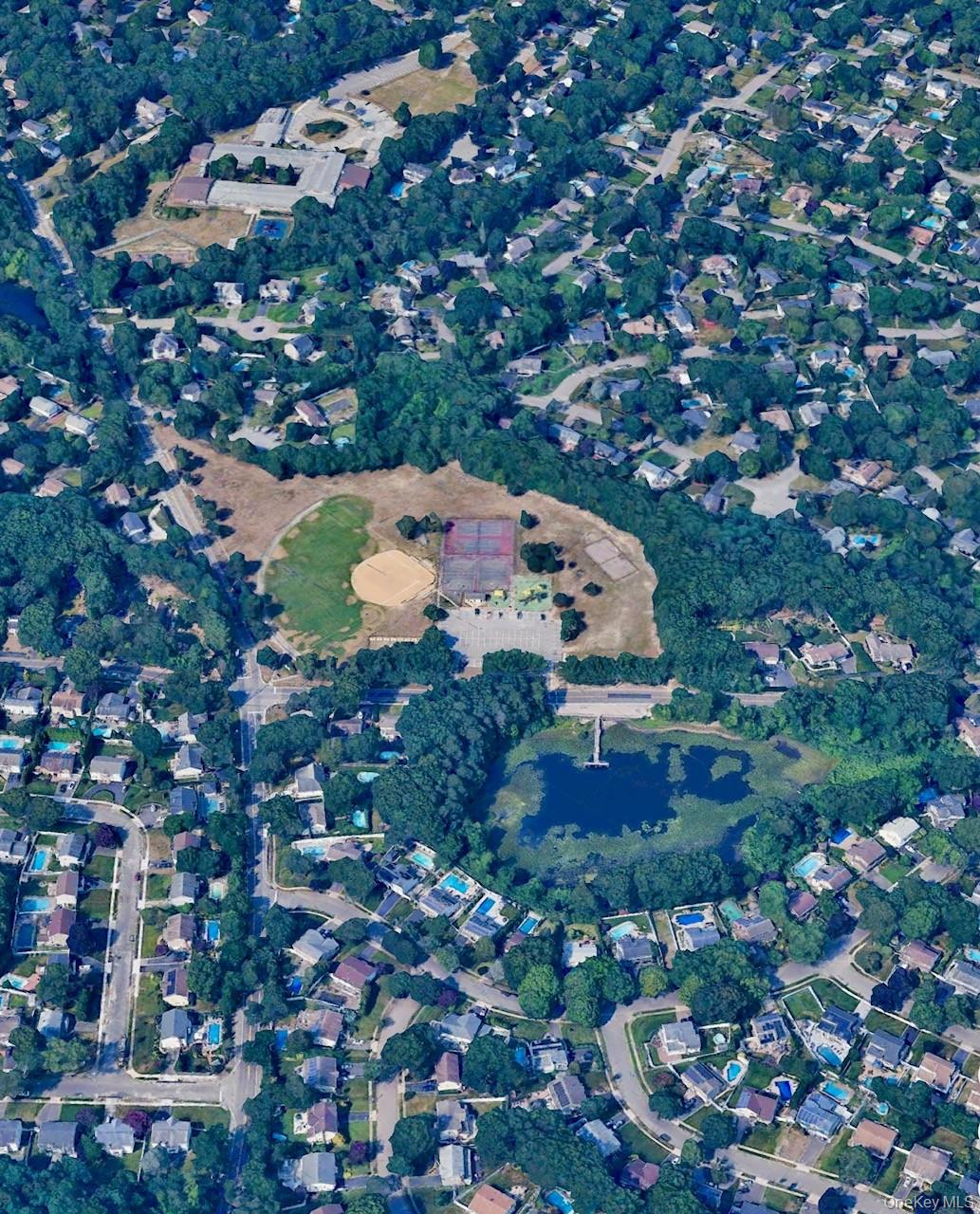 308 Browns Road Nesconset, NY 11767 - Photo 34 of 34 an aerial view of residential houses with outdoor space