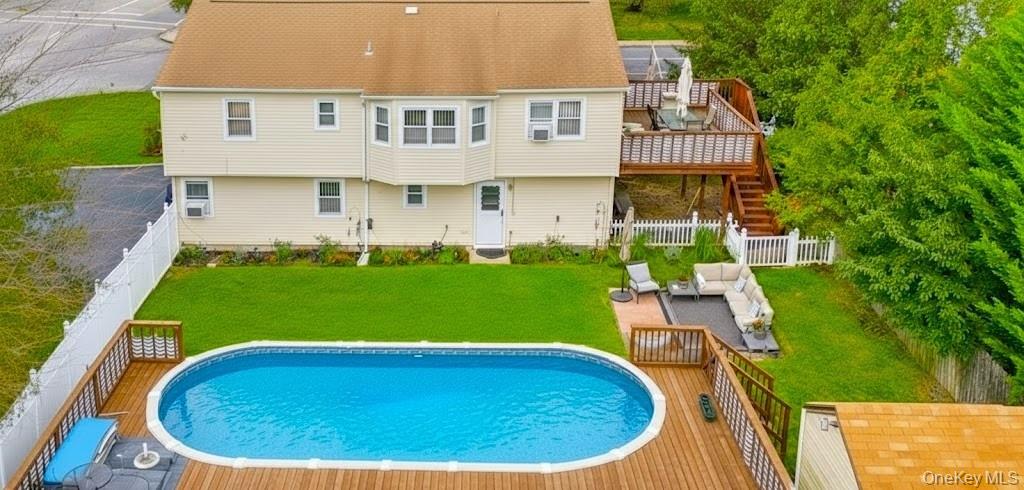 308 Browns Road Nesconset, NY 11767 - Photo 4 of 34 a view of a house with a backyard