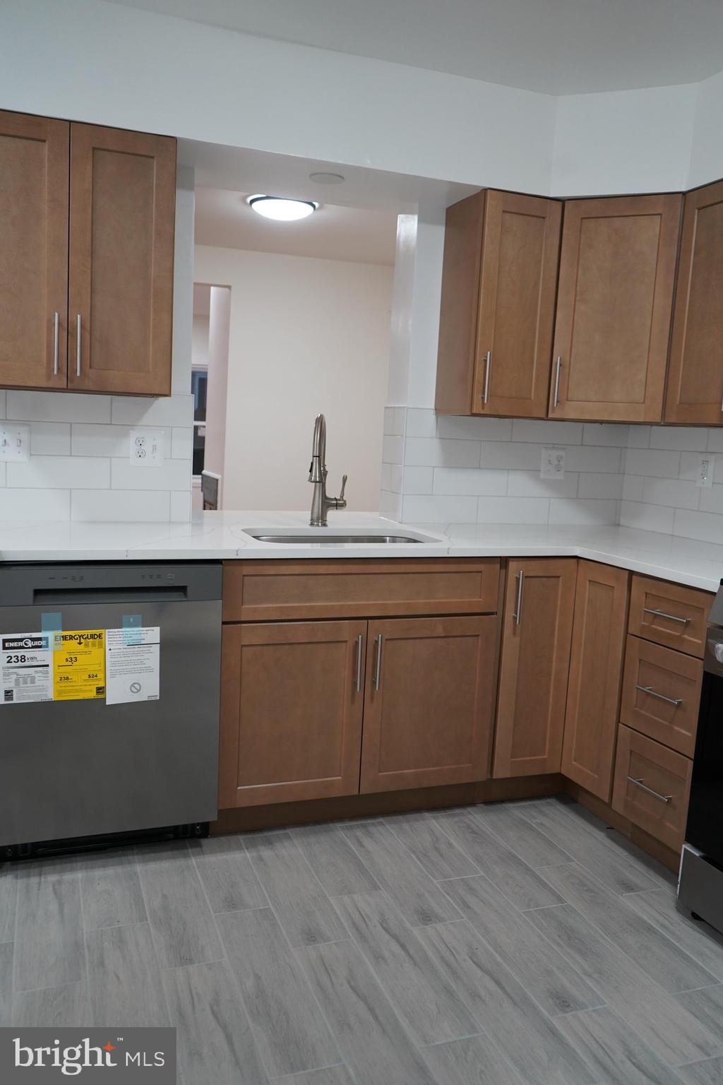 802 West Barre Street Baltimore, MD 21230 - Photo 13 of 72 a kitchen with a sink and cabinets