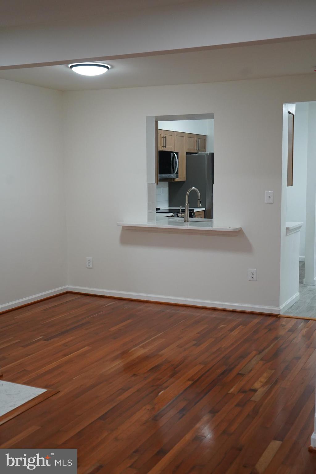 802 West Barre Street Baltimore, MD 21230 - Photo 22 of 72 a view of a living room with hardwood floor