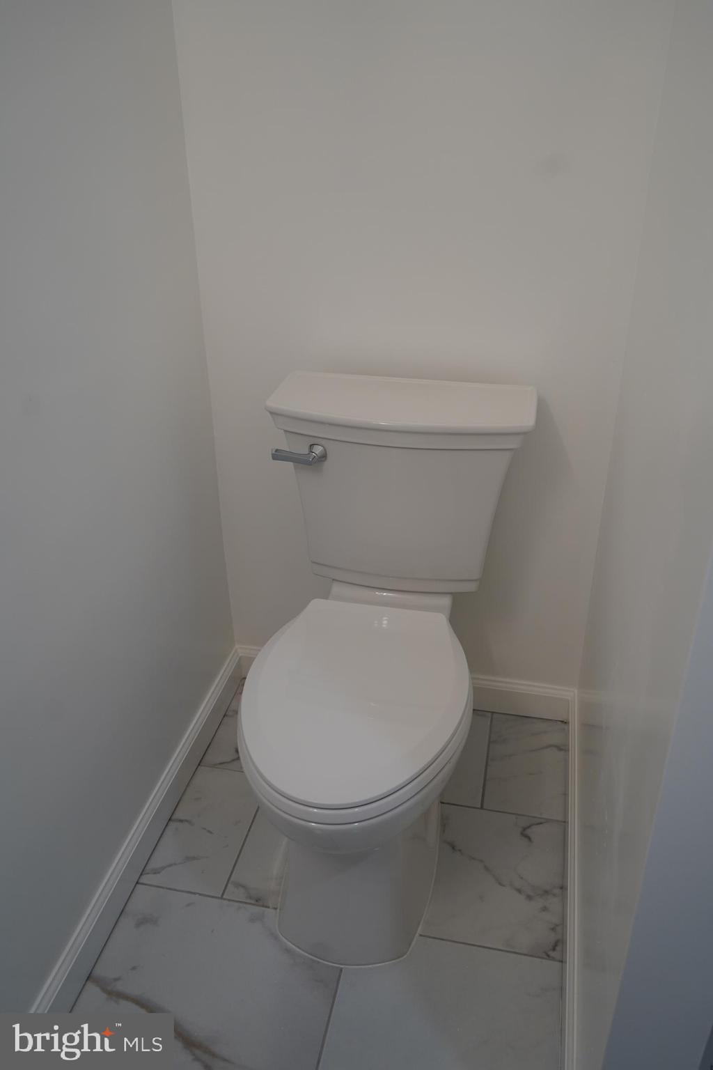 802 West Barre Street Baltimore, MD 21230 - Photo 40 of 72 a close view of a toilet in a bathroom