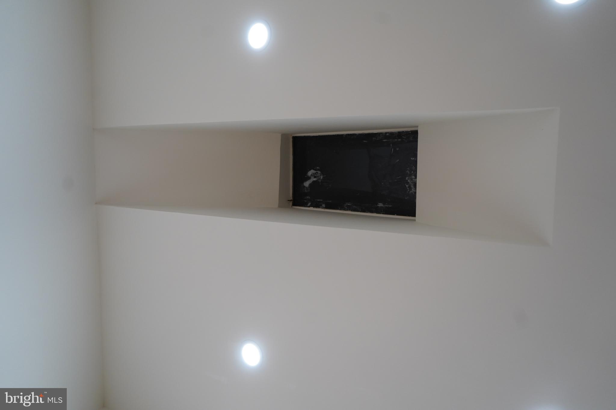 802 West Barre Street Baltimore, MD 21230 - Photo 47 of 72 a room with a fireplace